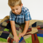 Boy using a Sensory Quilt