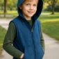 Child wearing blue weighted hoodie in park