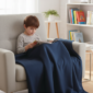 boy-with-weighted-blanket-on chair